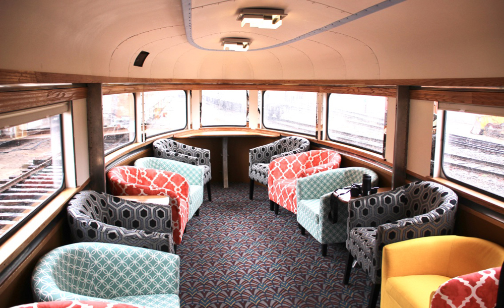 Multicolored seats in round-end observation car