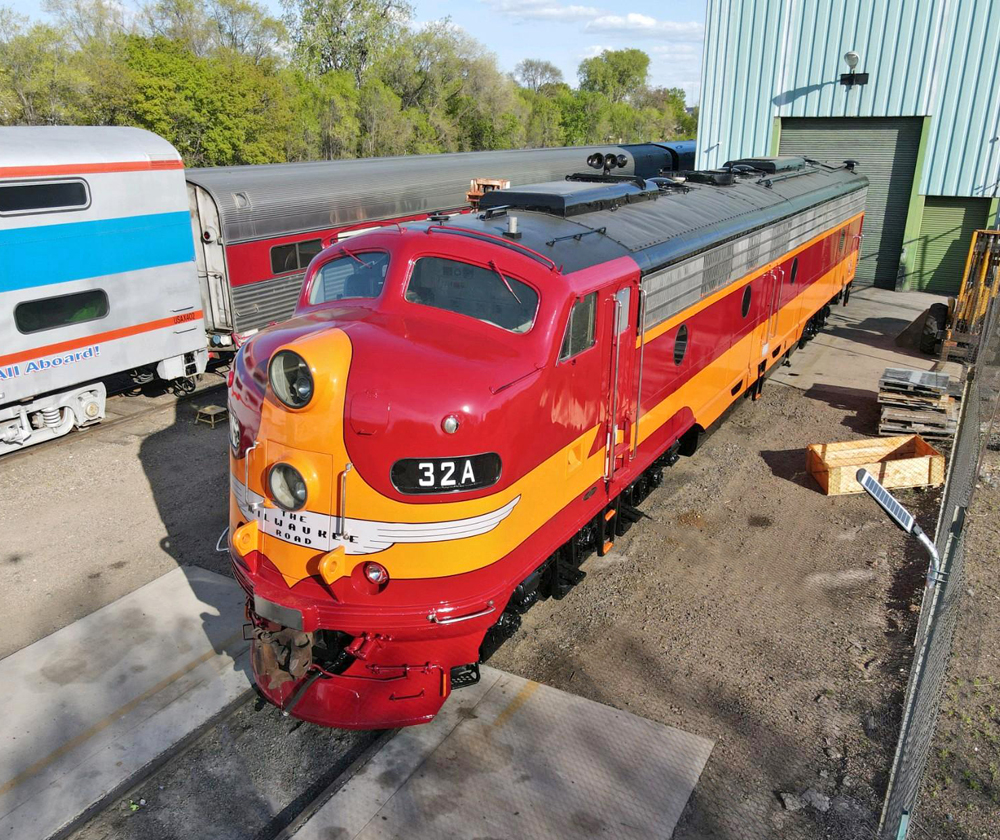 Maroon and orange diesel locomotive