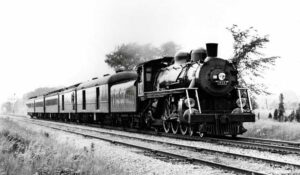Steam locomotive with passenger train