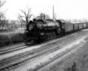 Steam locomotive with freight train