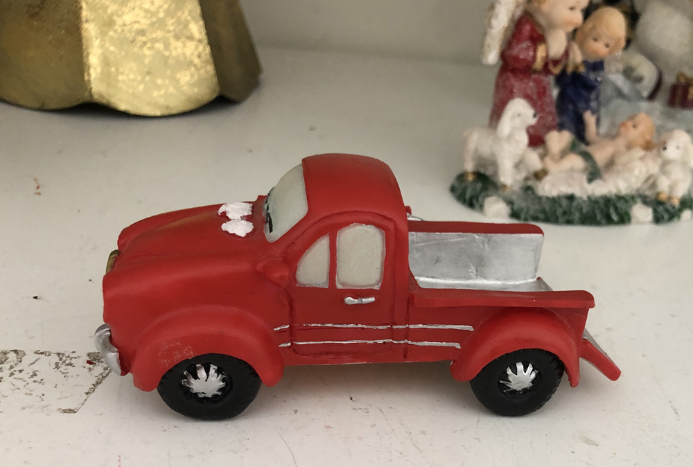 Red resin truck figurine