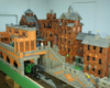 Backside of a city scene on a large-scale railway built of wooden blocks