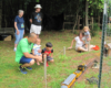  Kids and adults watch a large-scale train display