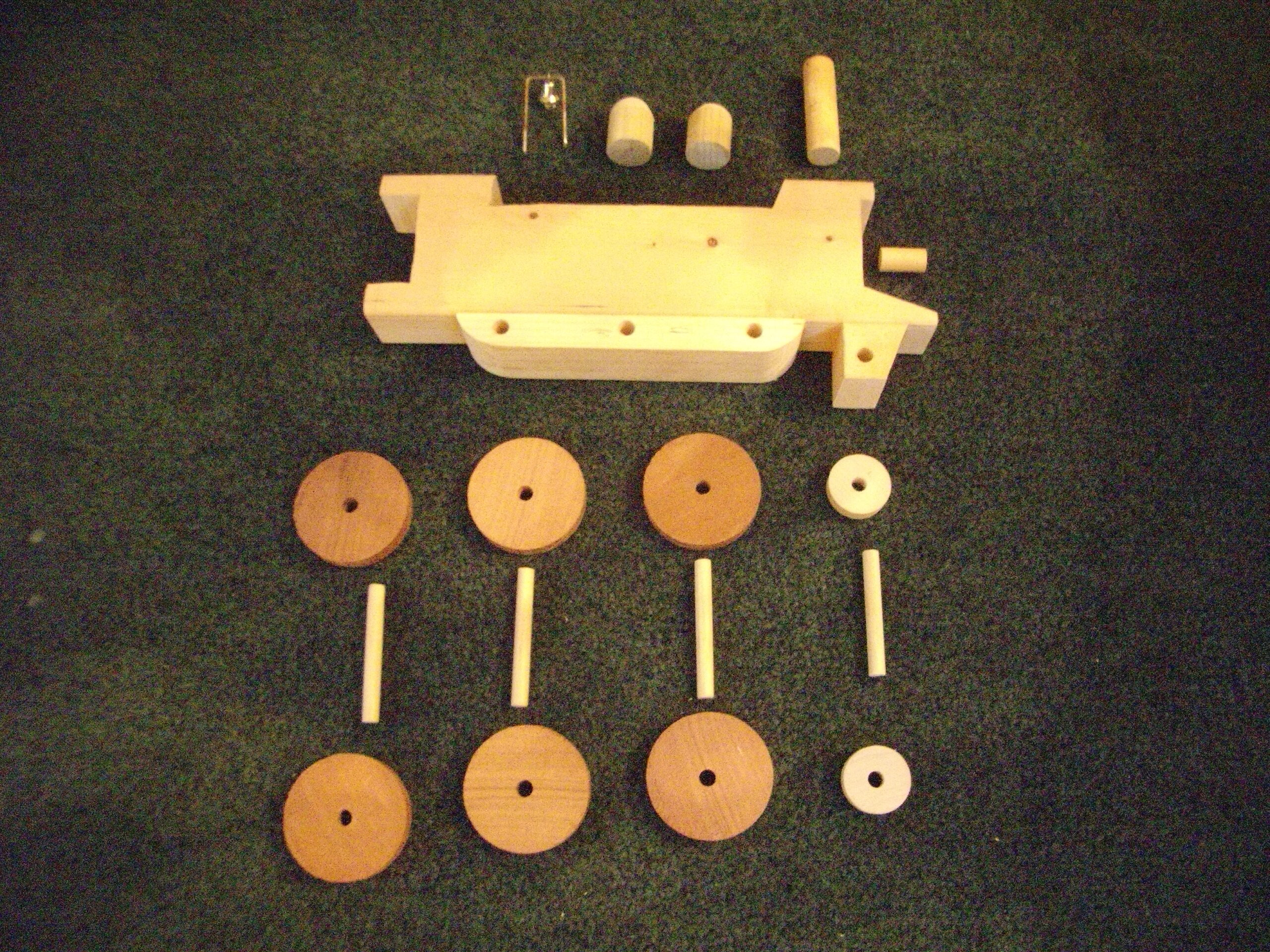 Pieces of wood to build a toy train for kids