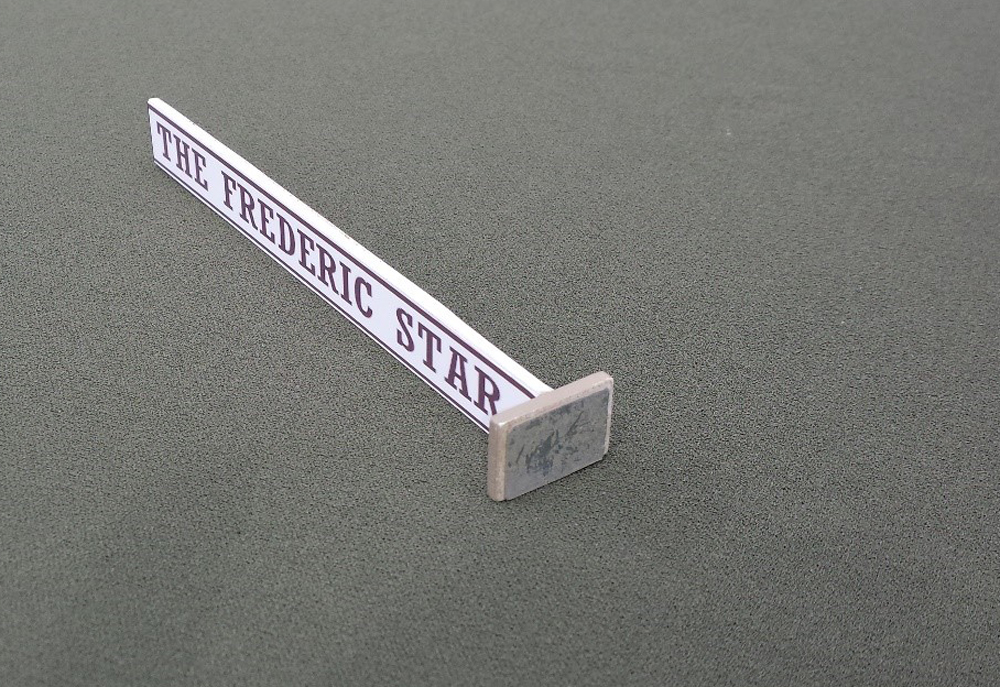 A projecting sign made from styrene and steel