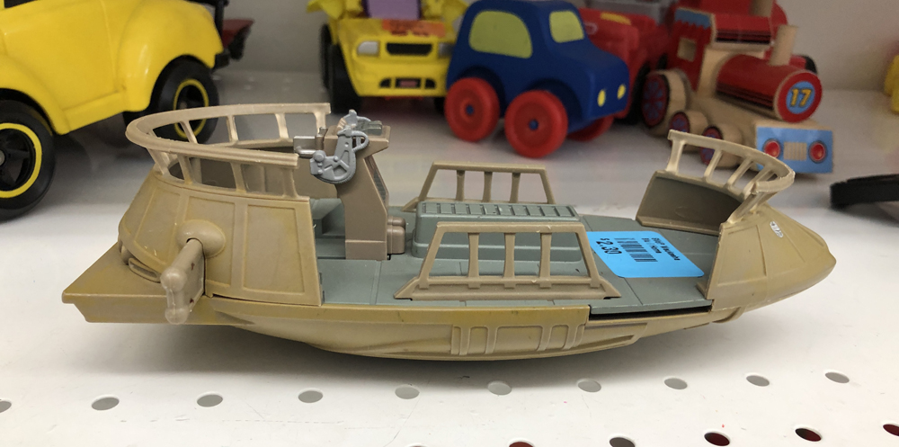 A plastic toy boat