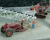 Model figures next to grain elevator