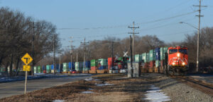 Red locomotive with freight in Wisconsin