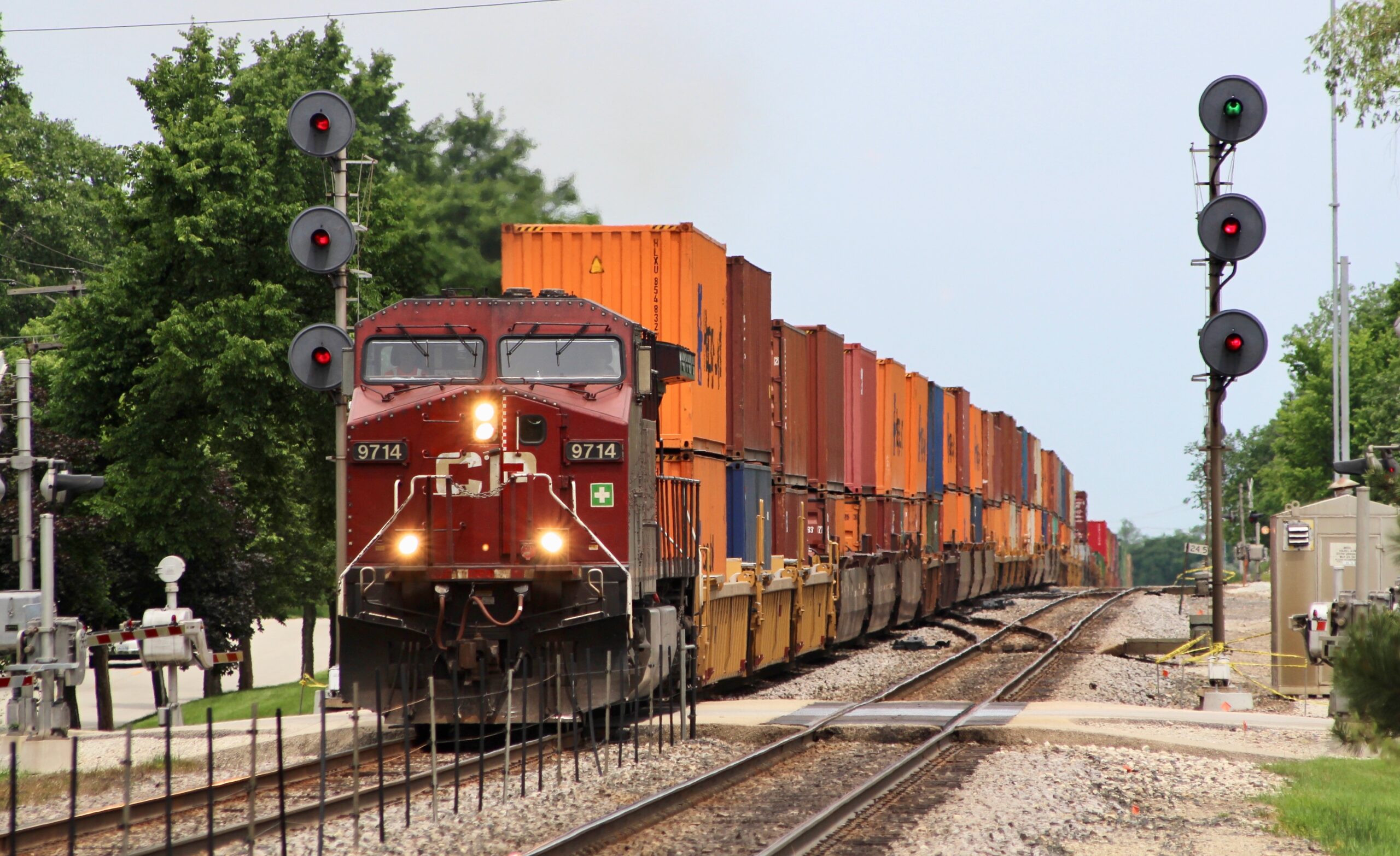 Red locomotive with freight in Illinois
