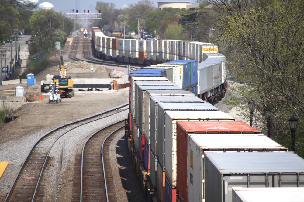 Intermodal train snakes through curves