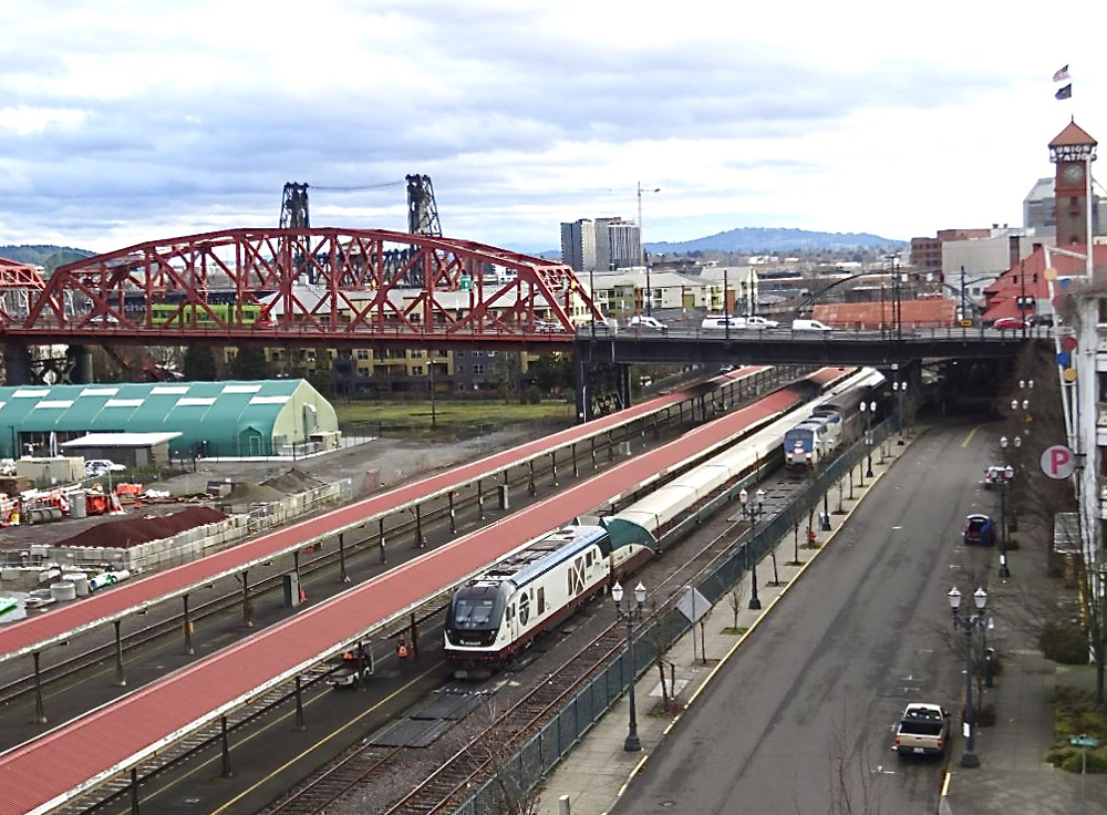 High-angle view of two trains at station