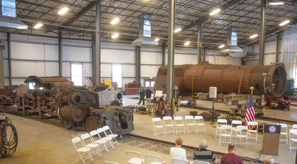 Disassembled steam locomotive in roundhouse