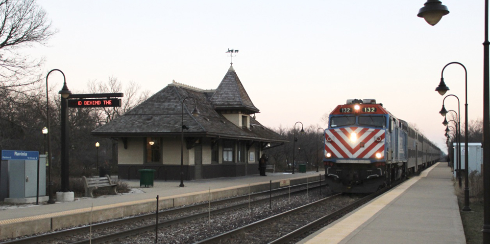 Commuter train arrives at station