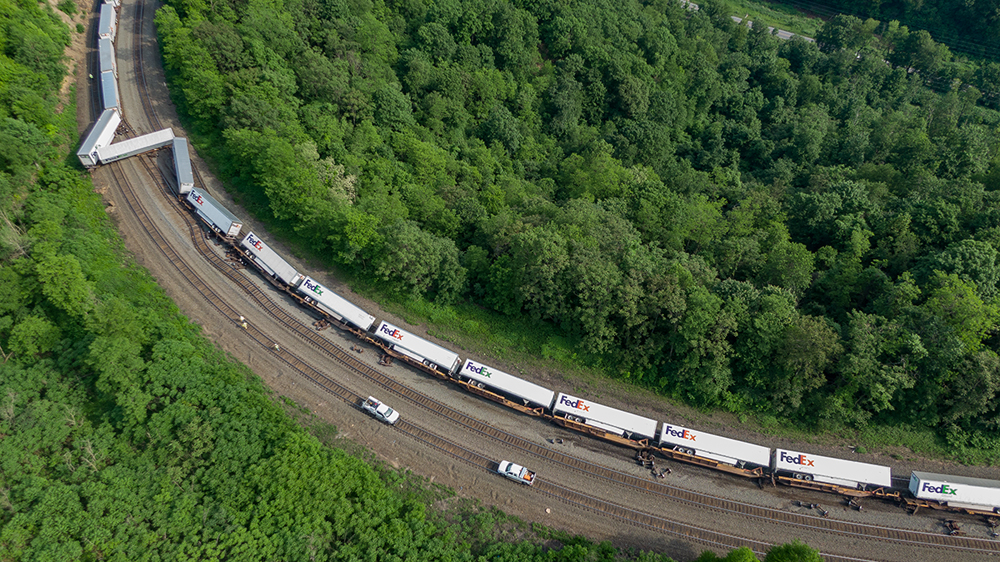 Overturned trailers on flatcars