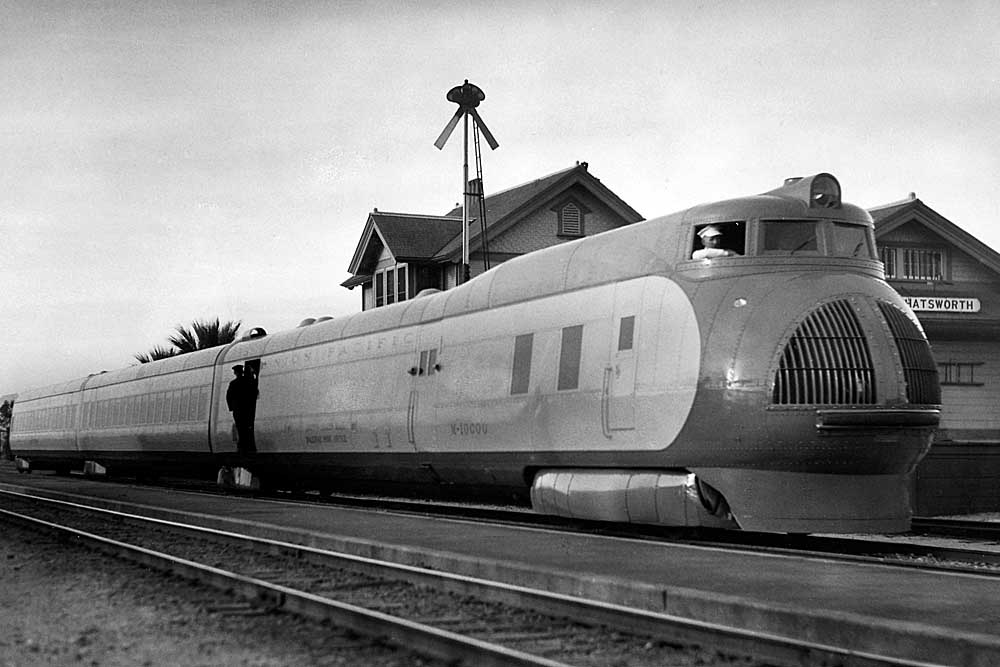 Streamlined passenger train stopped at station