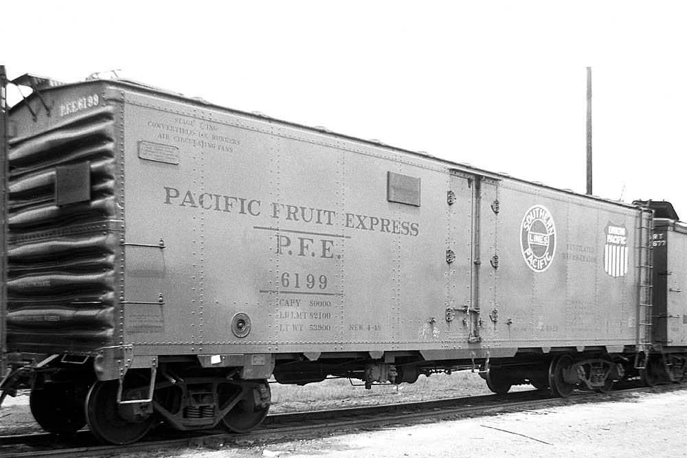 Three-quarter view of steel-constructed refrigerator rail car