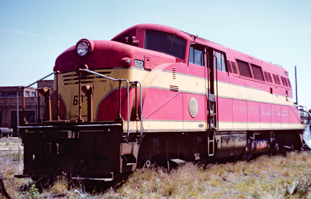 Red and yellow semi-streamlined diesel locomotive
