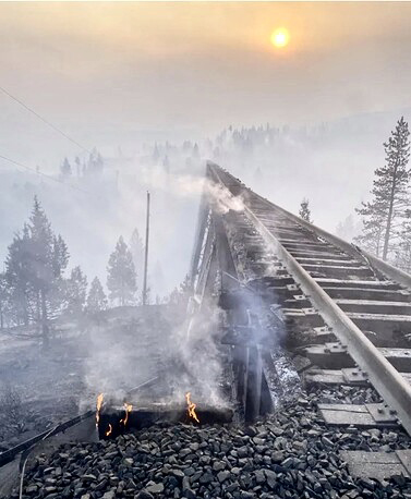 Smoldering bridge after fire