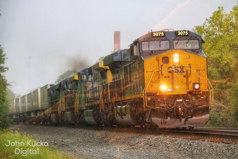 Freight train approaches during storm