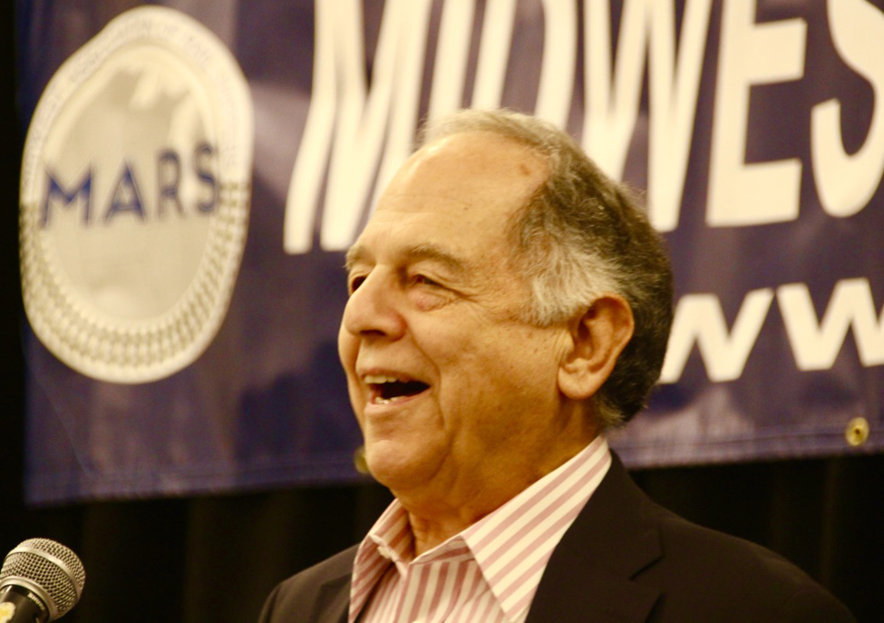 Man standing in front of banner for Midwest Association of Rail Shippers