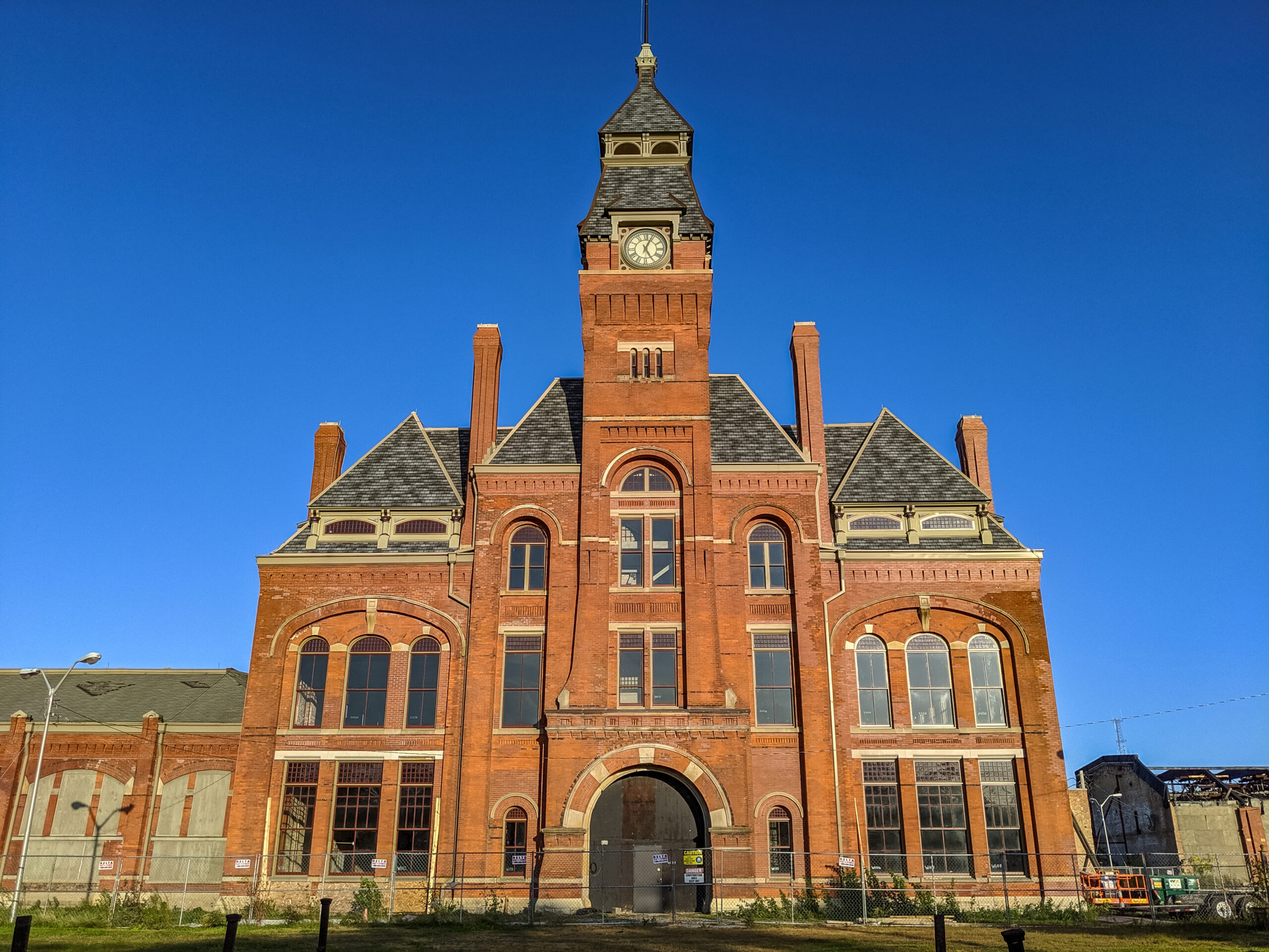 Ornate multistory brick building with clock tower