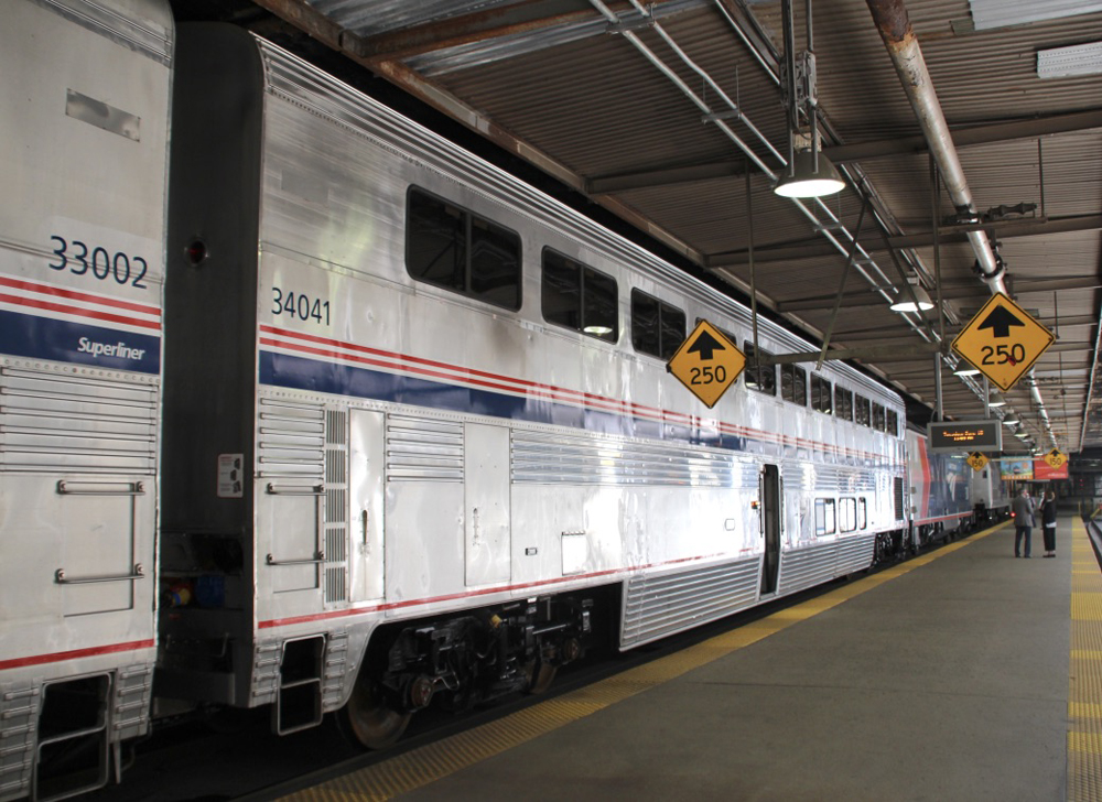 Bilevel stainless steel car at station platform