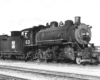 Black-and-white view of 2-8-0 steam locomotive