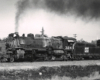 Black-and-white view of 2-8-2 steam locomotive