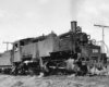 Black-and-white three-quarter view of 2-6-6-2 steam locomotive