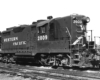 Black-and-white view of diesel road-switcher locomotive