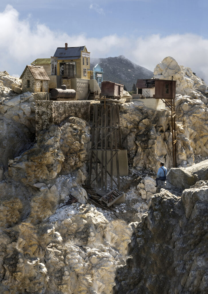 A model town on a rocky outcropping