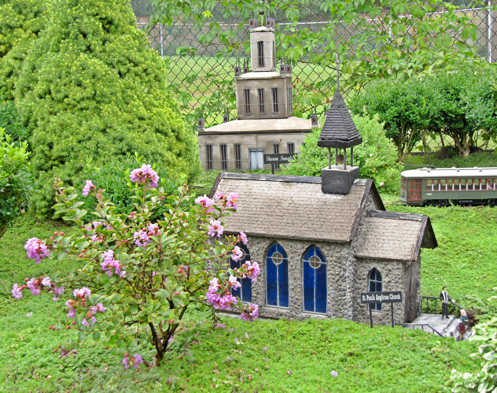 Miniature tree next to a model church