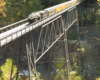 Model train on a high trestle