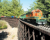 Model train on a wood trestle