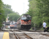 Trains prepare to meet on straight.