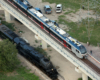 The Big Boy steam locomotive shares a scene with light rail equipment.