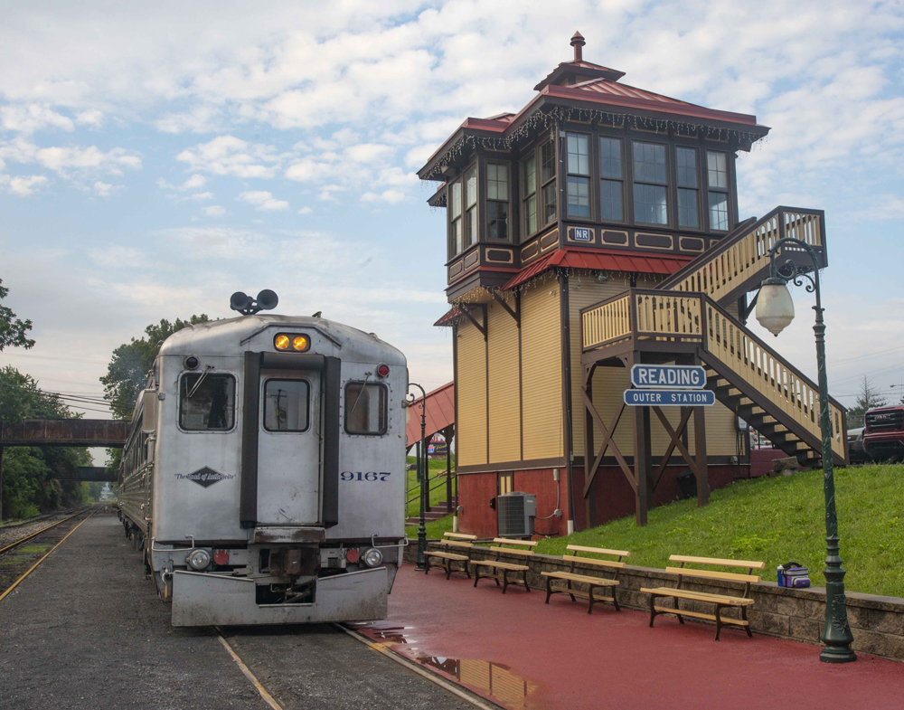 Stainless steel railcar at ornate station