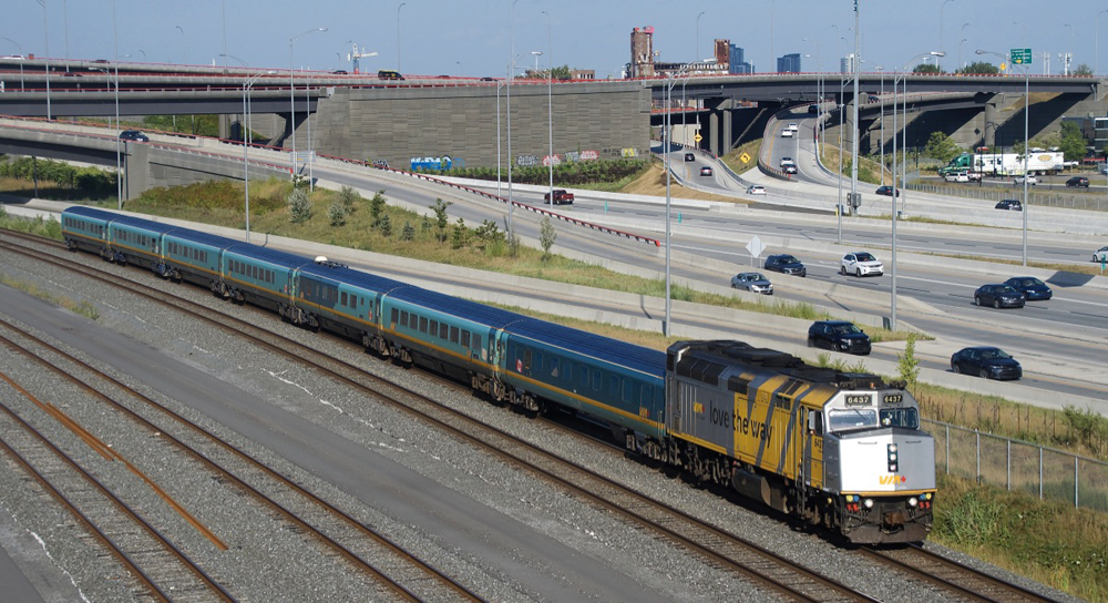 Passenger train with blue and yellow cars