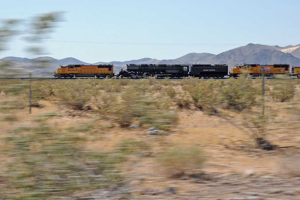Pacing a train moving at mainline speed with bushes whizzing by