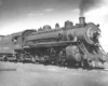 Black-and-white right-side photo of 4-6-2 steam locomotive