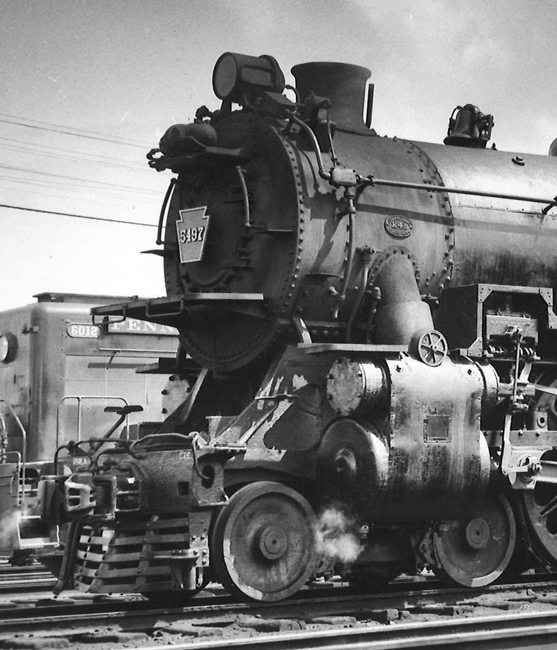 Black-and-white photo of front portion of 4-6-2 steam locomotive