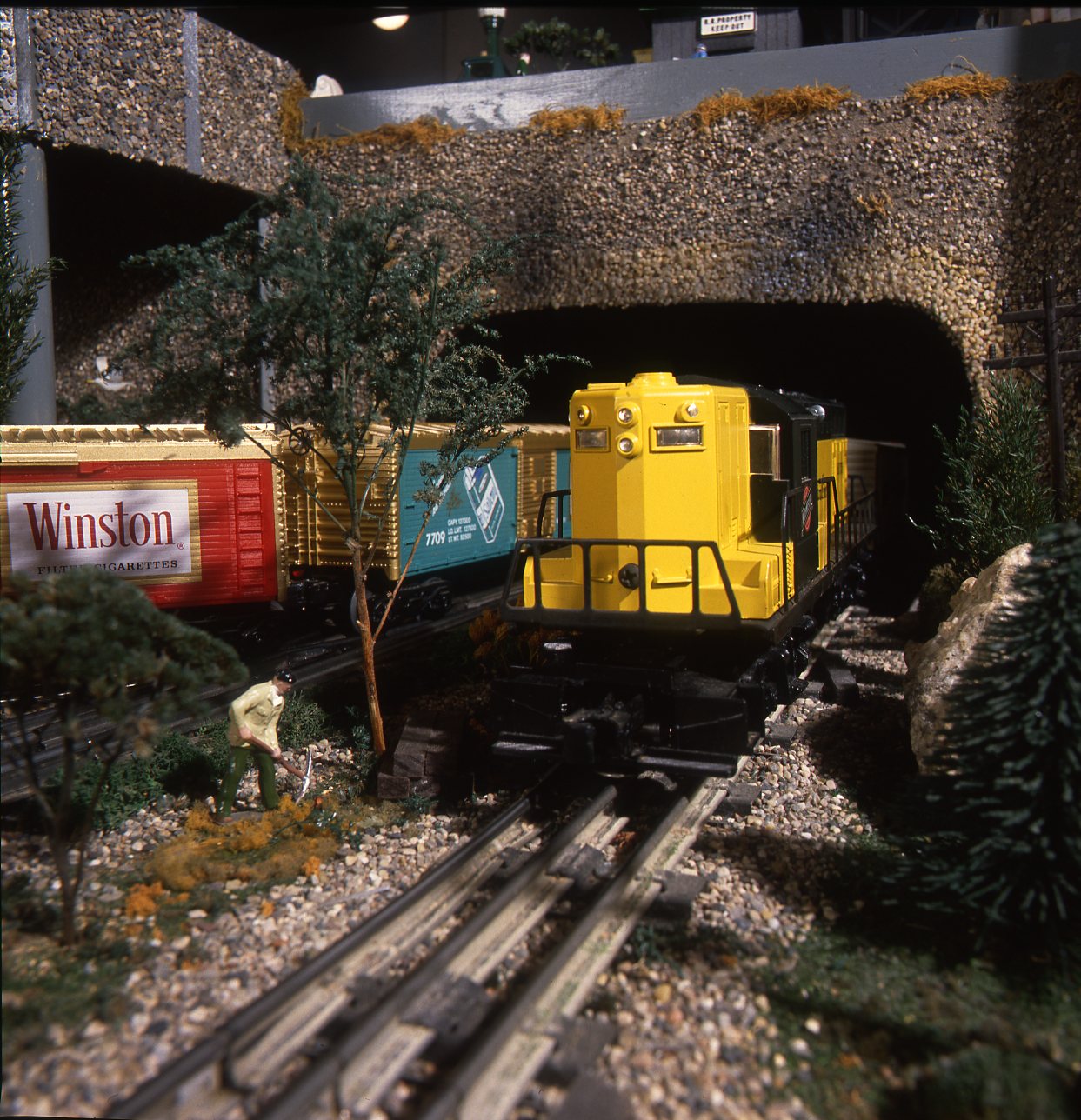 A Lionel diesel exiting a tunnel