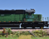 A green diesel locomotive bearing patched-out Wisconsin & Southern reporting marks rolls past motion-blurred scenery