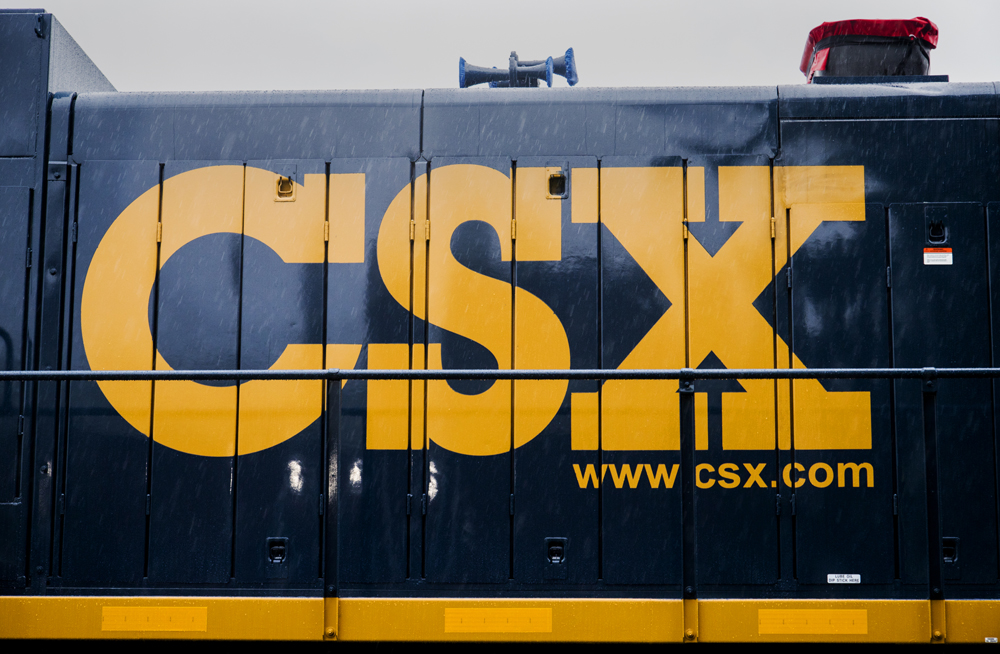 Yellow CSX letters with web address on side of locomotive