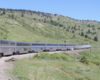 Passenger train with bilevel equipment on curve 