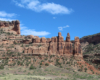 Red rock formations under blue skies