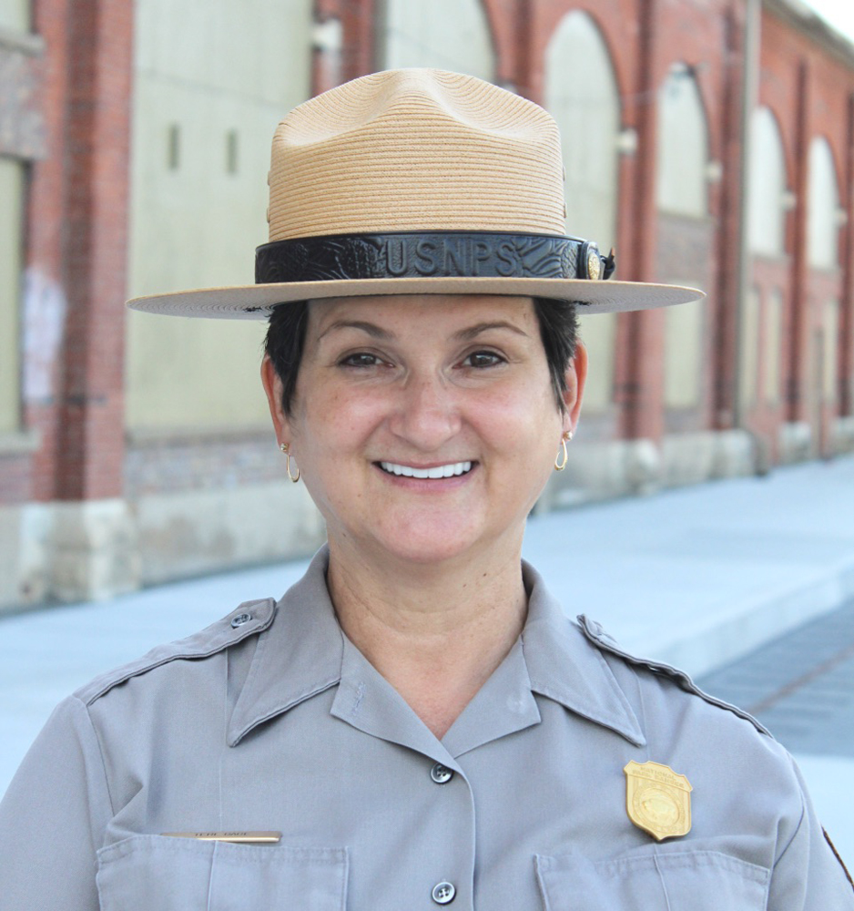 Woman in Park Service uniform with hat