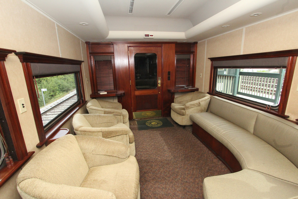 Chairs and sofas inside railroad car