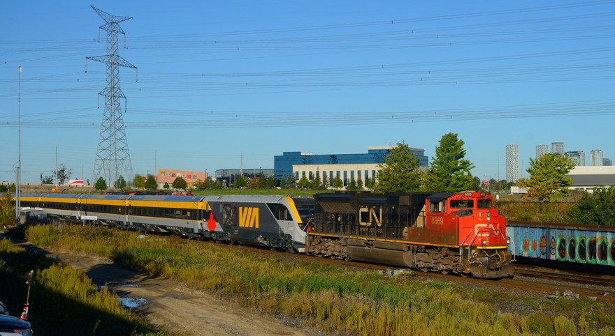 Passenger equipment pulled by Canadian National locomotive