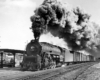 Black-and-white photo of steam locomotive with Reading Companyfreight train